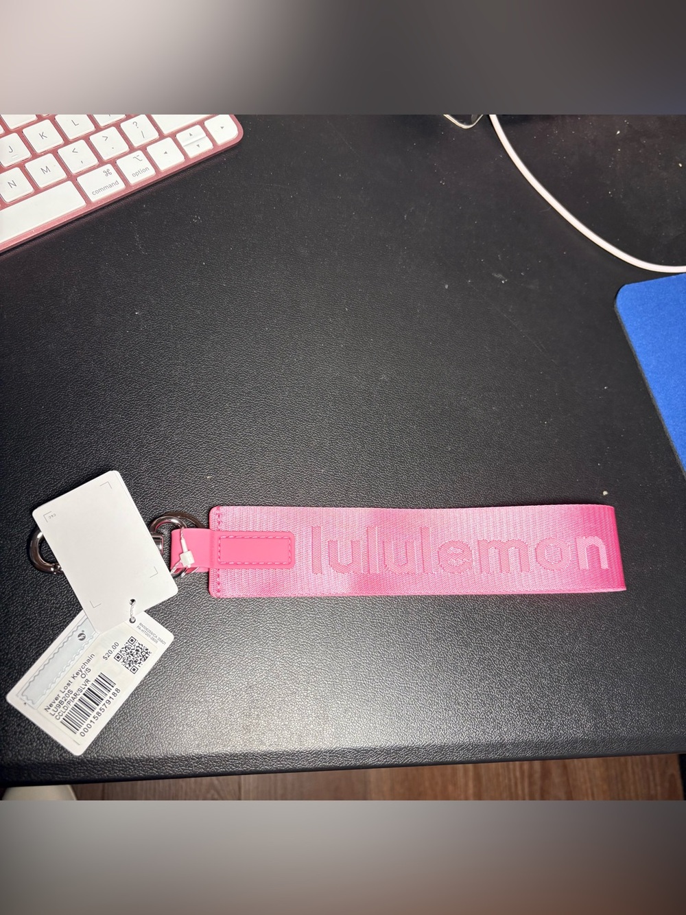 Lululemon Never Lost Keychain.  NWT. Sold out candy cloud/pink pearl